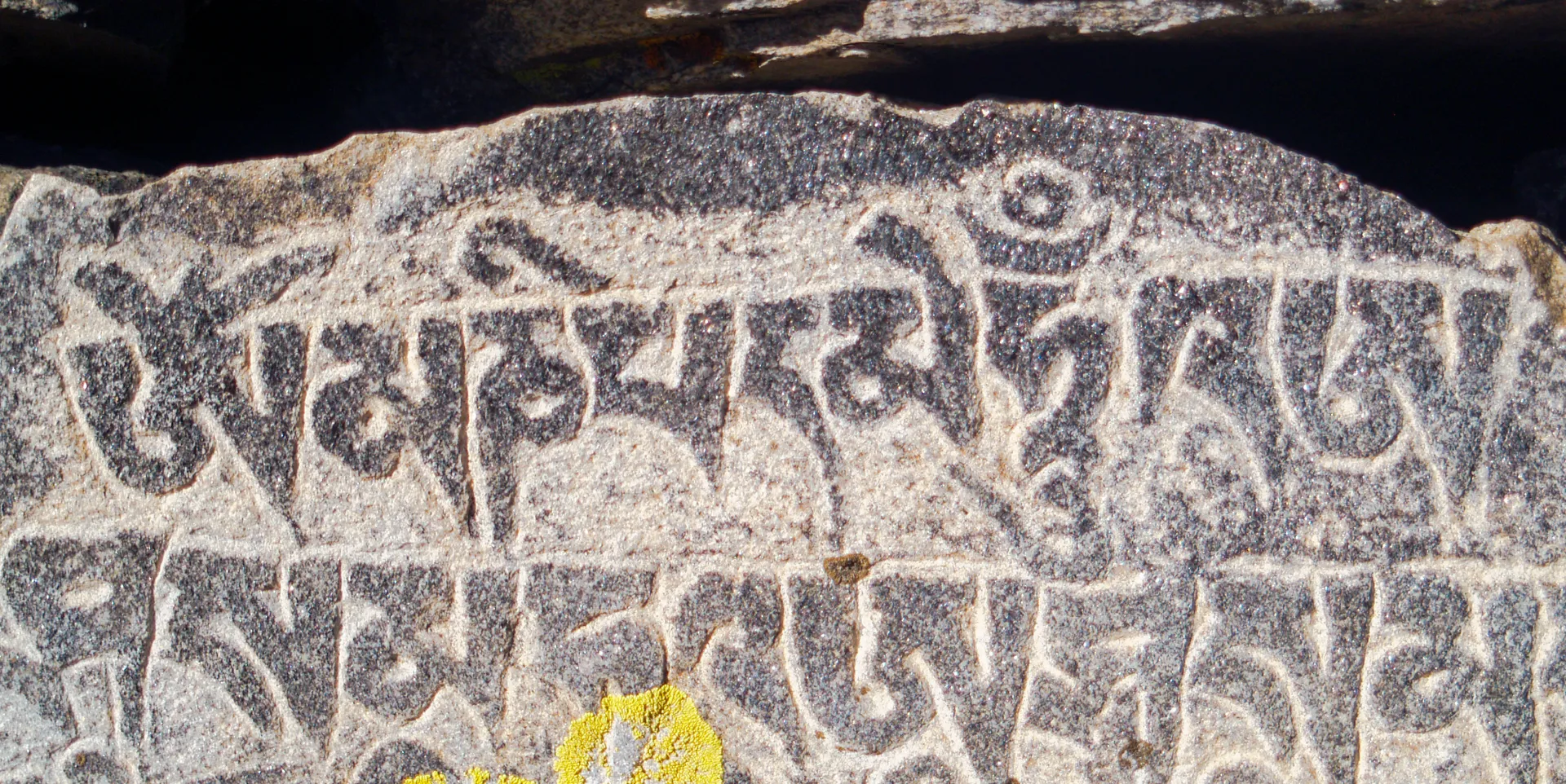 Mani engraved on stones, commonly found throughout the Himalayas